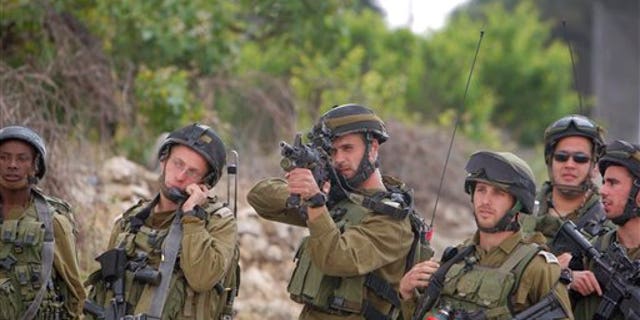 20c9ad47-Mideast Israel Palestinians