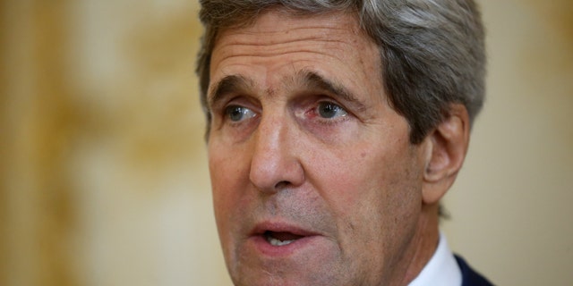 July 26, 2014: U.S. Secretary of State John Kerry speaks to reporters before his meeting with Qatari Foreign Minister Khaled al-Attiyah and Turkish Foreign Minister Ahmet Davutoglu regarding a cease-fire between Hamas and Israel in Gaza. (AP Photo/Charles Dharapak)