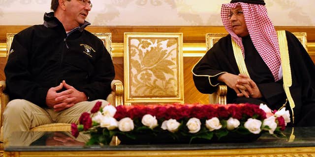U.S. Defense Secretary Ash Carter, left, meets with Kuwait's Defense Minister Sheikh Khaled Al Jarrah Al Sabah, at Kuwait City International Airport, Kuwait, Sunday, Feb. 22, 2015. Carter is on his first overseas trip since starting the Pentagon job last Tuesday. (AP Photo/Jonathan Ernst, Pool)