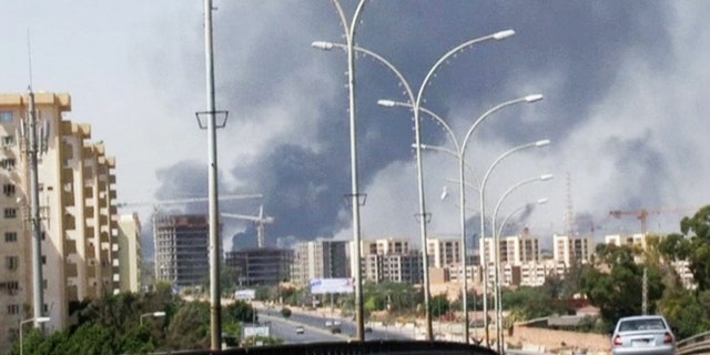July 13, 2014 - Smoke rises from the direction of Tripoli airport in Libya. Rival militias battled for control of the international airport, as gunfire and explosions echoed through the city and airlines canceled some international flights.
