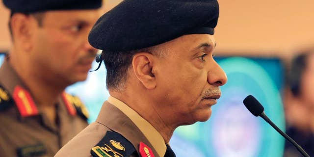 FILE - In this Friday, April 24, 2015 file photo, Saudi Interior Ministry spokesman Maj. Gen. Mansour al-Turki listens to journalists questions during a press conference in Riyadh, Saudi Arabia. Saudi Arabia said Tuesday, April 28, 2015, it has arrested a total of 93 people with ties to the Islamic State group in recent months, foiling their plans to carry out multiple terrorist attacks, including a strike on the U.S. Embassy in the kingdom's capital. Al-Turki said the arrests include a cell of 65 people arrested in March who were involved in a plan that included targeting residential compounds, prisons and security forces. (AP Photo/Hasan Jamali, File)