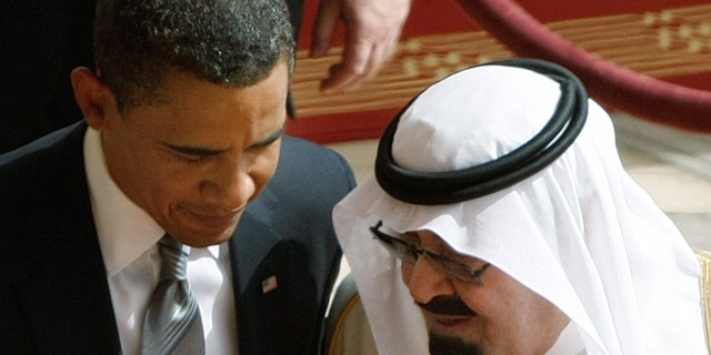 FILE - In this Wednesday, June 3, 2009 file photo, King Abdullah of Saudi Arabia, right, speaks with U.S. President Barack Obama, during arrival ceremonies at the Royal Terminal of King Khalid International Airport in Riyadh, Saudi Arabia. (AP Photo/Hassan Ammar)