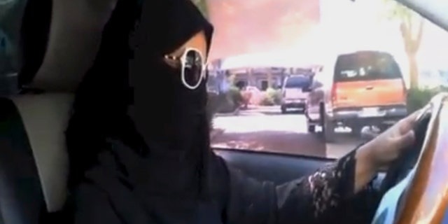 Oct. 26, 2013: In this image made from video provided by the Driving campaign, which has been authenticated based on its contents and other AP reporting, a Saudi woman drives a vehicle in Riyadh, Saudi Arabia.