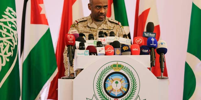 April 14, 2015: Saudi military spokesman Ahmed Asiri briefs journalists on the Saudi-led coalition's strikes on Houthi rebels in Yemen, during a press conference, in Riyadh, Saudi Arabia.