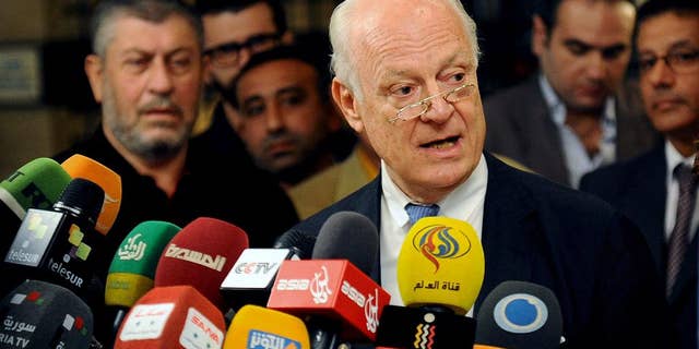 FILE - In this Sept. 11, 2013 file photo, Syrian Minister of National Reconciliation Ali Haidar speaks during an interview with The Associated Press in Damascus, Syria on Wednesday, Sept. 11, 2013. Haidar said Monday, Nov. 17, 204 in an interview with AP that Damascus has agreed "in principle" to the U.N. envoy Staffan de Mistura's call for local cease-fires to try to ease the worst fighting in the country's civil war, but that the government needs more details before it can make a final decision. De Mistura has called for an incremental truce in the northern city of Aleppo as a first step toward a wider peace. (AP Photo, File)