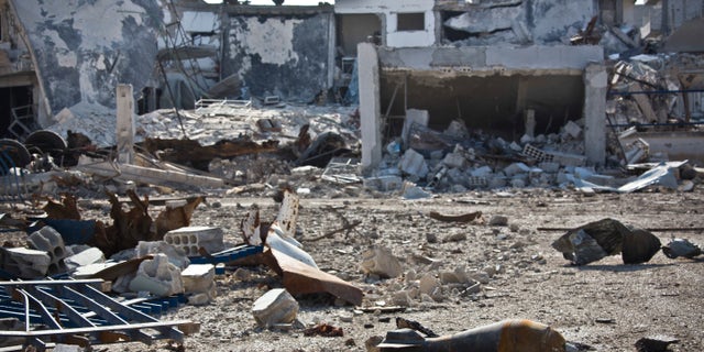 Nov. 19, 2014 - Mortars litter the streets in Kobani, Syria, where Kurdish fighters backed by small numbers of Iraqi peshmerga forces and Syrian rebels, are locked in a battle against the Islamic State group, who swept into their town in mid-September. Syria's vice foreign minister denied Monday that his government ever used chemical weapons or chlorine during the country's brutal civil war and warned that terror groups are using such weapons.