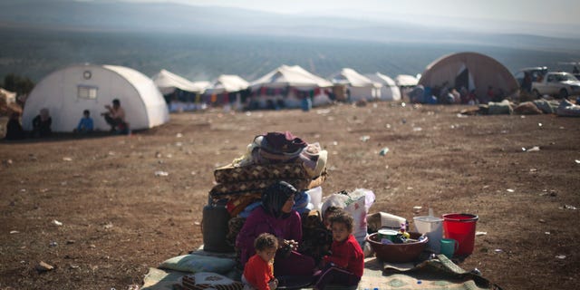 Nov. 7, 2012 - Syrian family who fled from the violence in their village, at a displaced camp, in the Syrian village of Atma.
