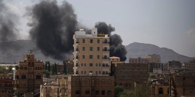September 21, 2014: Smokes rises from an area during clashes between Sunni militiamen and Hawthi Shiite rebels in Sanaa, Yemen. (AP Photo/Hani Mohammed)