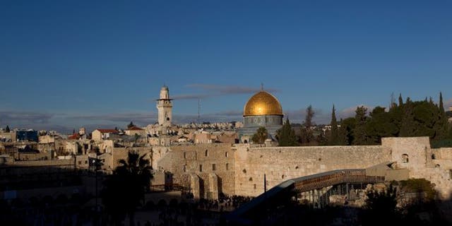 The Western Wall and golden Dome of the Rock in Jerusalem's Old City. 