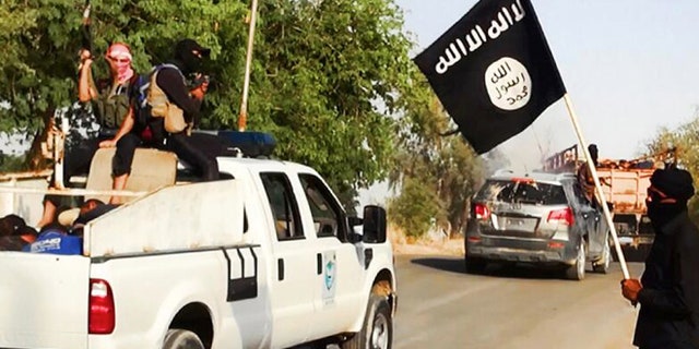 June 14, 2014: Image on a militant website that appears to show militants from Islamic State of Iraq and the Levant near Tikrit, Iraq.