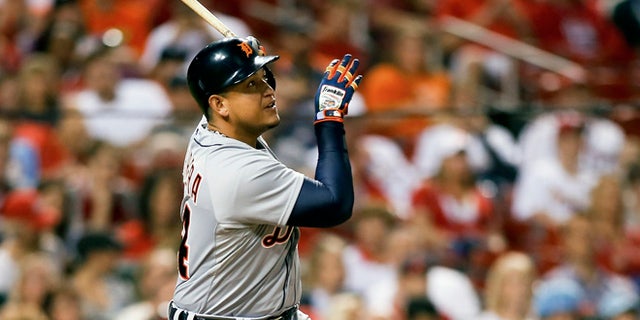 Detroit Tigers' Miguel Cabrera follows through on his two run home run during the seventh inning of a baseball game against the St. Louis Cardinals Friday, May 15, 2015, in St. Louis. (AP Photo/Scott Kane)
