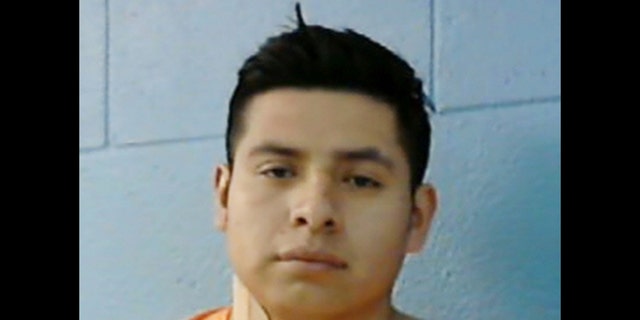This undated photo provided by the Fayette County Sheriff's Office shows Miguel Mejia-Ramos, who was captured early Tuesday, Jan. 21, 2014, at a vehicle roadblock in Schulenburg, Texas, located between Houston and San Antonio. Police say Mejia-Ramos is considered a suspect in the fatal stabbings of his two young daughters and wife in the Queens borough of New York. (AP Photo/Fayette County Sheriff's Office)