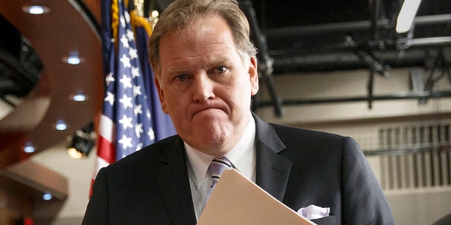 This March 25, 2014 file photo shows House Intelligence Committee Chairman Mike Rogers, R-Mich., leaving a press conference on Capitol Hill in Washington.