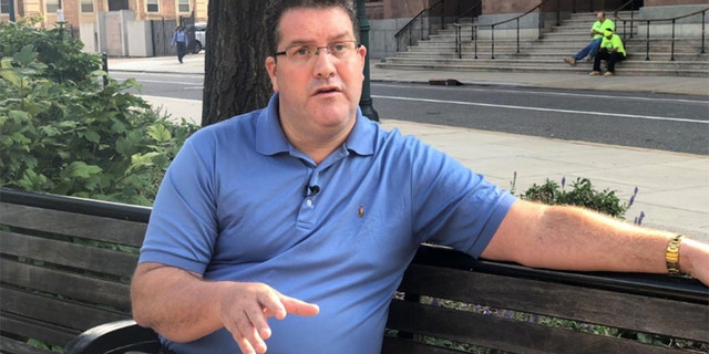 Catholic priest abuse victim Mike McDonnell speaks in front of the Cathedral Basilica of Saints Peter and Paul in Philadelphia, Pennsylvania.