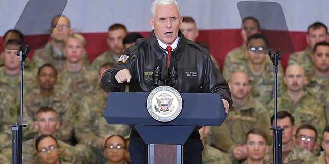 U.S. Vice President Mike Pence speaks to troops in a hangar at Bagram Air Field in Afghanistan on December 21, 2017.