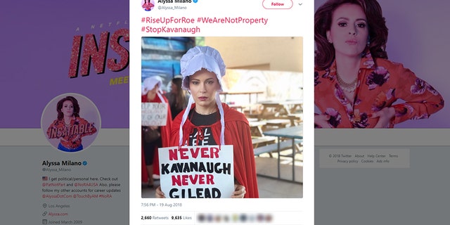 Actress Alyssa Milano dressed up as a character from "The Handmaid's Tale" to protest Trump’s Supreme Court nominee Brett Kavanaugh.