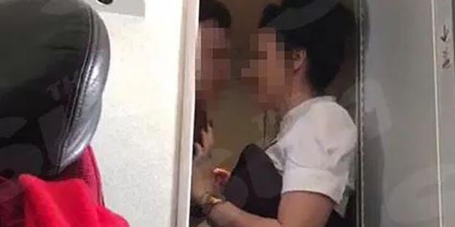 Passengers say the woman was "totally sloshed" before boarding at Gatwick Airport.