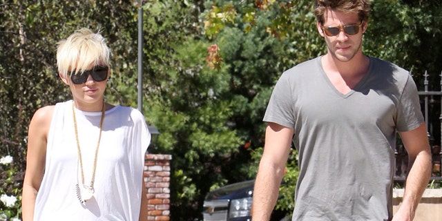 Miley Cyrus and Liam Hemsworth visit a friend in Pasadena. Sunday, September 2, 2012.