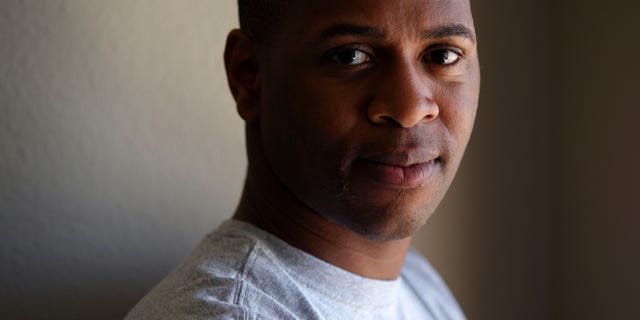 July 15: Navy medical corpsman Andrew James, who is now in the U.S. Navy Reserve poses for a picture in San Diego. Gay service members from Army soldiers to Air Force officers are planning to celebrate the official end of the military's 17-year policy that forced them to hide their sexual orientation with another official act - marriage.