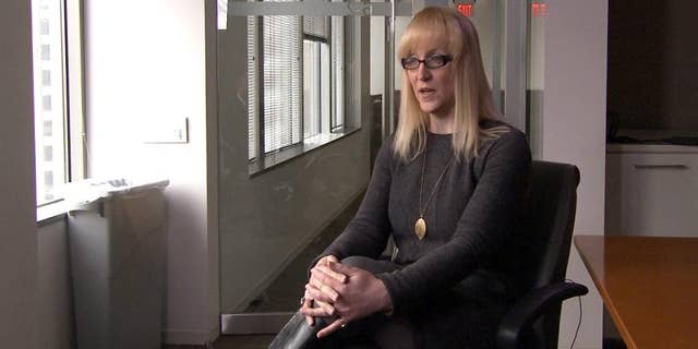 This image from video shows Allyson Robinson, policy director for an association of lesbian, gay, bisexual and transgender military personnel called Service members, Partners, and Allies for Respect and Tolerance for All, or SPARTA, during an interview with The Associated Press on Tuesday, March 24, 2015, in Washington. U.S. officials say Defense Secretary Ash Carter has gotten pushback from senior military leaders on whether the Pentagon should lift its ban on transgender people serving in the armed forces. Robinson acknowledged the issues raises challenging questions for the military. But said other nations, including Australia, Canada and Britain, have found solutions. (AP Photo/Bill Gorman)