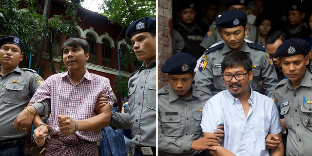 Reuters journalists Kyaw Soe Oo and Wa Lone will face trial in Burma; they are accused of illegally possessing official information. (Thein Zaw / The Associated Press)