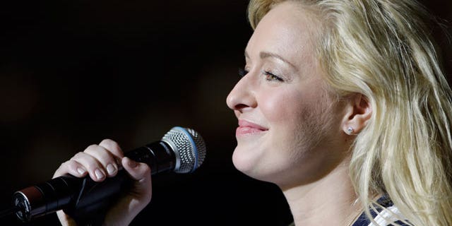 In this undated file photo, country singer Mindy McCready performs in Nashville, Tenn. A missing persons report has been filed for McCready and her 5-year-old son Zander. (AP)