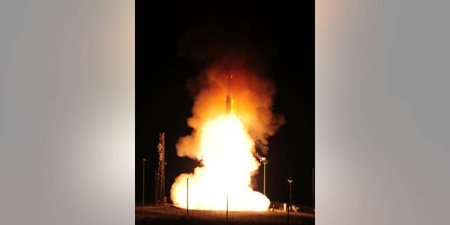 In this photo provided by the U.S. Air Force, an unarmed Minuteman 3 missile launches on Wednesday, Aug. 19, 2015, at Vandenberg Air Force Base, Calif. The Air Force said the missile was launched from California in a test of the intercontinental ballistic missile system. (Joe Davila/U.S. Air Force via AP)