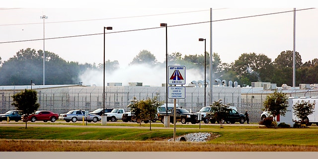 May 20, 2012: Smoke rises above the Adams County Correctional Center in Natchez, Miss.
