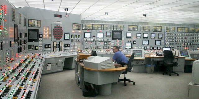 June 26: A worker monitors the control room of Nebraska Public Power District's Cooper nuclear power plant near Brownville, Neb.