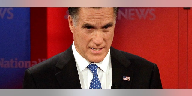 Republican presidential candidate former Massachusetts Gov. Mitt Romney gestures during a Republican presidential debate Monday Jan. 23, 2012, at the University of South Florida in Tampa, Fla. (AP Photo/Paul Sancya)
