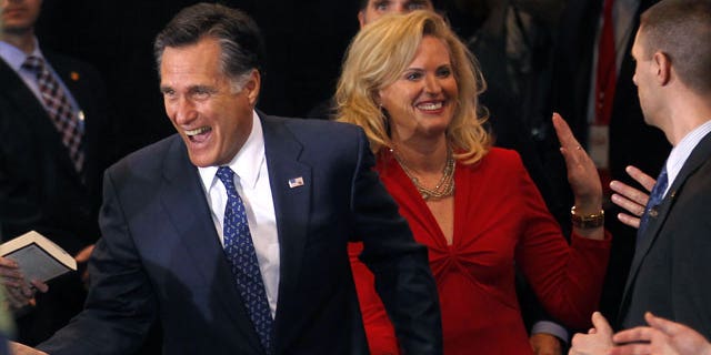Feb. 28, 2012: Republican presidential candidate, former Massachusetts Gov. Mitt Romney, arrives with his wife Ann at his election watch party after winning the Michigan primary in Novi, Michigan.