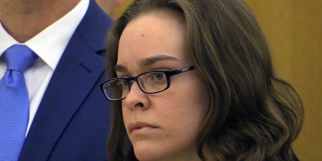 April 8, 2015: Lacey Spears looks towards Judge Robert Neary during her sentencing onat the Westchester County Courthouse in White Plains, N.Y. Spears, convicted of killing her son by poisoning him with salt, has been sentenced to 20 years to life in prison. (AP Photo/The Journal News, Joe Larese, Pool)