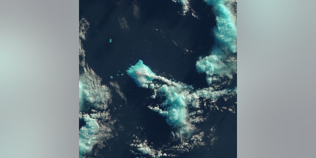 Nobody lives near Mount Sourabaya, but a NASA satellite captured its eruption in the South Atlantic in this false-color image.