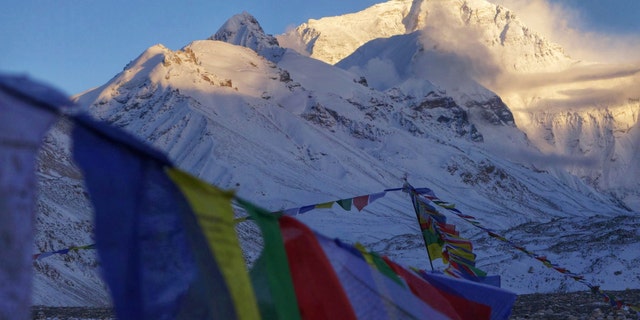 This undated photo provided by Alpenglow Expeditions, Mount Everest is seen from a base camp on the northern Tibetan side of the mountain.