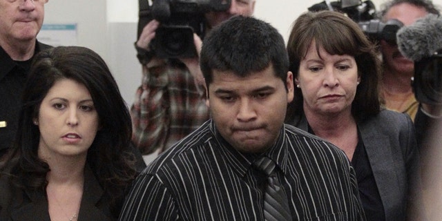 Erick Munoz arrives for a court hearing to possibly decide if his wife is removed from life support in Fort Worth, Texas on Friday, Jan. 24, 2014. Attorneys for the Fort Worth-area family will ask a judge to allow a pregnant, brain-dead Texas woman to be removed from life support, despite hospital opposition. State District Judge R.H. Wallace will hear arguments as the husband of Marlise Munoz seeks to remove her from life support. Munoz remains connected to machines. (AP Photo/Star-Telegram, Ron T. Ennis)