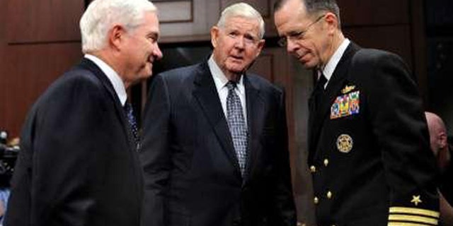 Rep. John P. Murtha, D-PA, (C) escorts Secretary of Defense Robert Gates (L) and Chairman of the Joint Chiefs of Staff Adm. Michael Mullen to testify before the House Defense Appropriations Subcommittee on the fiscal year 2010 defense budget, on Capitol Hill, May 20, 2009. (Reuters)