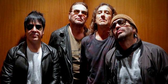 Members of the Mexican rock band ManÃÂ pose during an interview in New York.