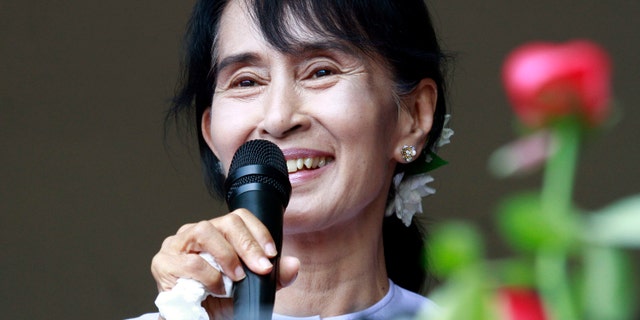 April 2, 2012: Myanmar pro-democracy leader Aung San Suu Kyi talks to supporters at the headquarters of her National League for Democracy party in Yangon, Myanmar.