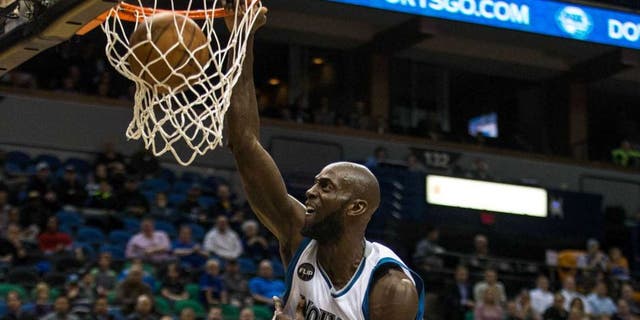 Monday, Dec. 7: Minnesota Timberwolves forward Kevin Garnett dunks over Los Angeles Clippers forward Blake Griffin during the third quarter at Target Center.