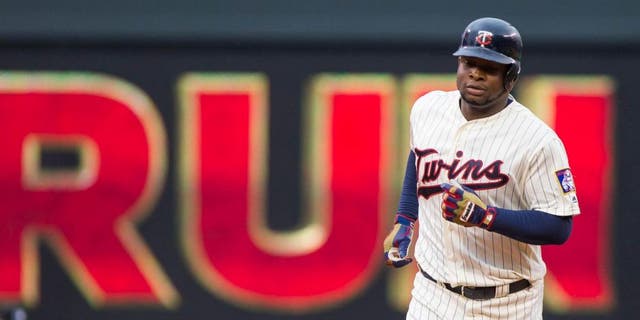 Wednesday, May 11, 2016: Minnesota Twins outfielder Miguel Sano rounds the bases on his 23rd birthday after hitting a home run in the second inning against the Baltimore Orioles at Target Field.