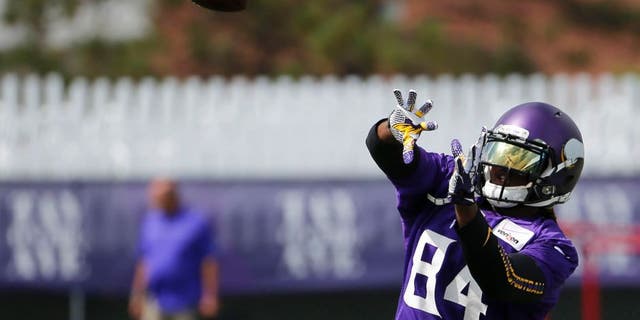 Monday, July 27: Minnesota Vikings wide receiver Cordarrelle Patterson keeps his eye on the ball during practice at training camp on the campus of Minnesota State University in Mankato, Minn.