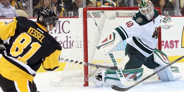 Tuesday, Nov. 17: Minnesota Wild goalie Devan Dubnyk makes a save against Pittsburgh Penguins right wing Phil Kessel during the second period at the CONSOL Energy Center in Pittsburgh, Penn.