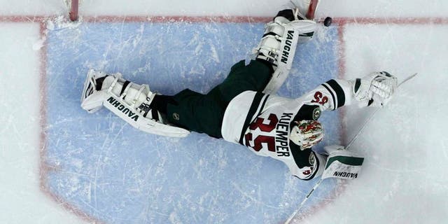 Thursday, November 20: The Minnesota Wild's Darcy Kuemper blocks a shot during the second period against the Philadelphia Flyers. The Wild won 3-2.