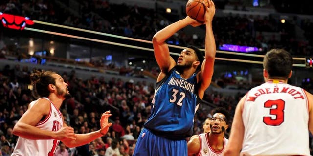 Saturday, Nov. 7: Minnesota Timberwolves center Karl-Anthony Towns shoots over Chicago Bulls center Joakim Noah during the second half at the United Center. Minnesota won 102-93 in overtime.