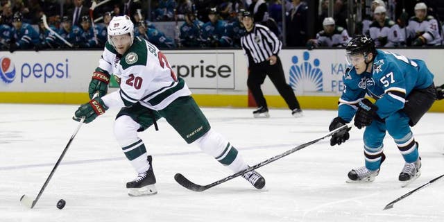 Saturday, Dec. 12: The Minnesota Wild's Ryan Suter skates past the San Jose Sharks' Tommy Wingels during the second period of the Wild's 2-0 win in San Jose, Calif.