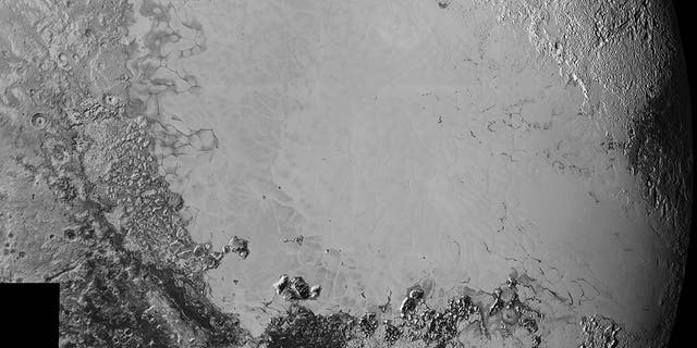 Mosaic of high-resolution images of Pluto, sent back from NASA’s New Horizons spacecraft from Sept. 5 to 7, 2015. The image is dominated by the informally-named icy plain Sputnik Planum, the smooth, bright region across the center. The image was taken as New Horizons flew past Pluto on July 14, 2015, from a distance of 50,000 miles.