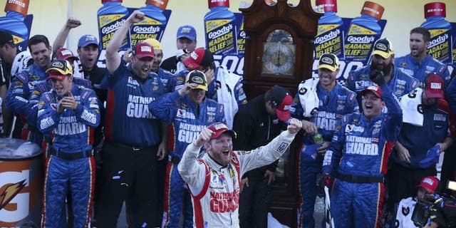 Dale Earnhardt Jr., driver of the #88 National Guard Chevrolet, celebrates in victory lane after winning during the NASCAR Sprint Cup Series Goody's Headache Relief Shot 500 at Martinsville Speedway on October 26, 2014 in Martinsville, Virginia.