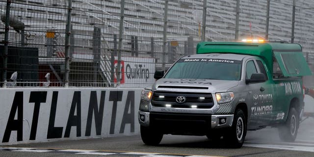 HAMPTON, GA - MARCH 01: A NASCAR Air Titan 2.0 drys the track prior to the NASCAR Sprint Cup Series Folds of Honor QuikTrip 500 at Atlanta Motor Speedway on March 1, 2015 in Hampton, Georgia. (Photo by Matt Sullivan/NASCAR via Getty Images)