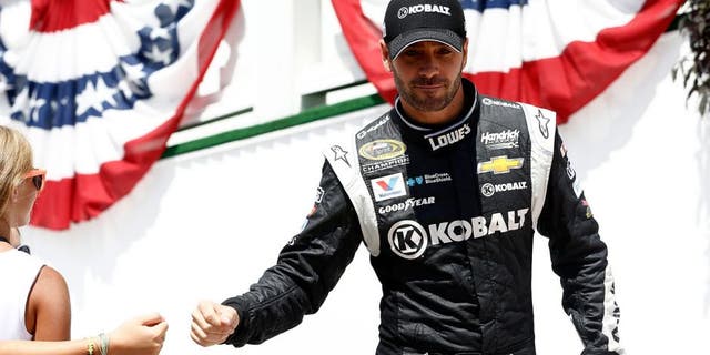 LONG POND, PA - AUGUST 02: Jimmie Johnson, driver of the #48 Kobalt Tools Chevrolet, takes part in pre-race ceremonies for the NASCAR Sprint Cup Series Windows 10 400 at Pocono Raceway on August 2, 2015 in Long Pond, Pennsylvania. (Photo by Jeff Zelevansky/NASCAR via Getty Images)