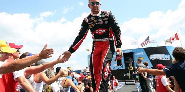 BROOKLYN, MI - AUGUST 16: Austin Dillon, driver of the #3 Dow Chevrolet, is introduced during pre-race ceremonies before the NASCAR Sprint Cup Series Pure Michigan 400 at Michigan International Speedway on August 16, 2015 in Brooklyn, Michigan. (Photo by Nick Laham/NASCAR via Getty Images)